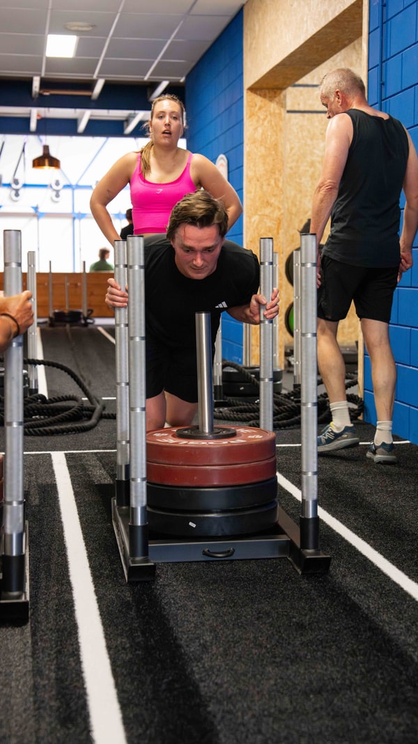 Deelnemers tijdens de HYROX Simulatie bij CrossFit Alkmaar
